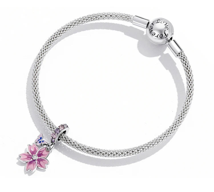 Blüte mit Schmetterling - Charm-Anhänger