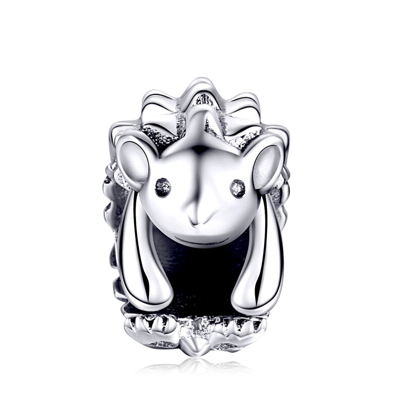 curling up hedgehog - charm pendant