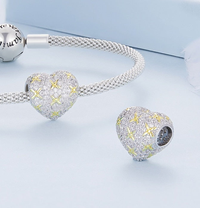 Golden four-leaf heart - charm